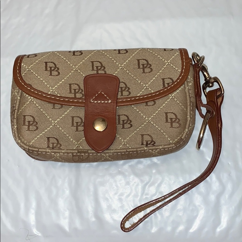 Dooney & Bourke tan & brown button flap wristlet
